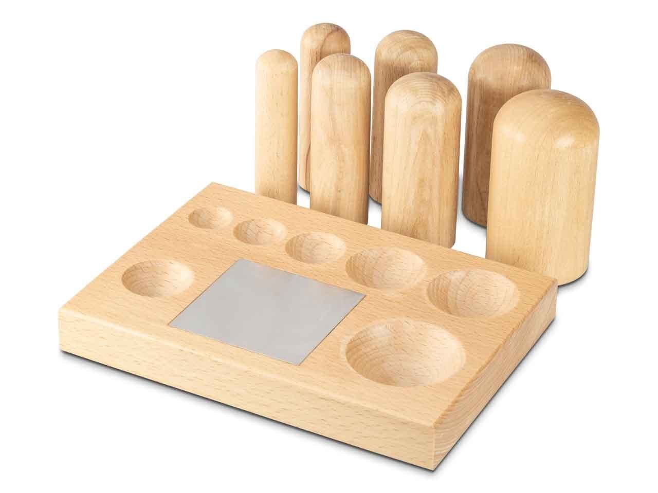 wooden dapping block with steel and punches Wooden Dapping Block with Steel and Punches - Image 1